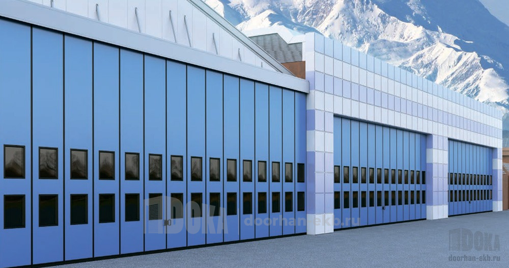 Промышленные складные ворота Дорхан с окошками и нижней направляющей  цвет синий ral 5005
